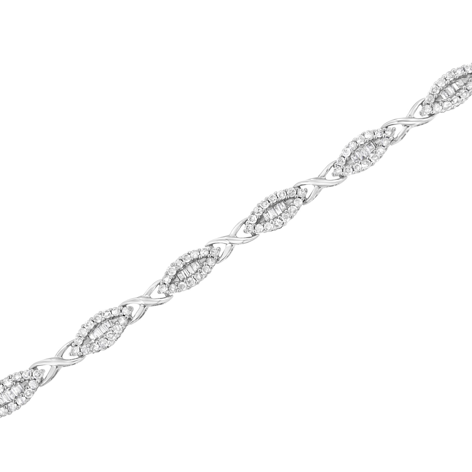 White metal bracelet with alternating marquise-shaped links featuring round gemstone pavé settings surrounding rows of baguette-shaped gemstones in channel settings, shown in a diagonal close-up view.
