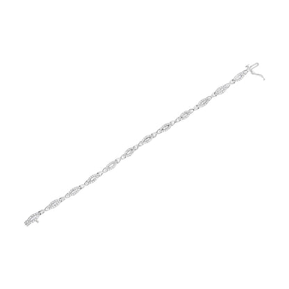 White metal bracelet with alternating oval-shaped sections featuring pave-set round white gemstones and twisted links, accented with channel-set baguette white gemstones, shown at a slight diagonal angle on a white background.