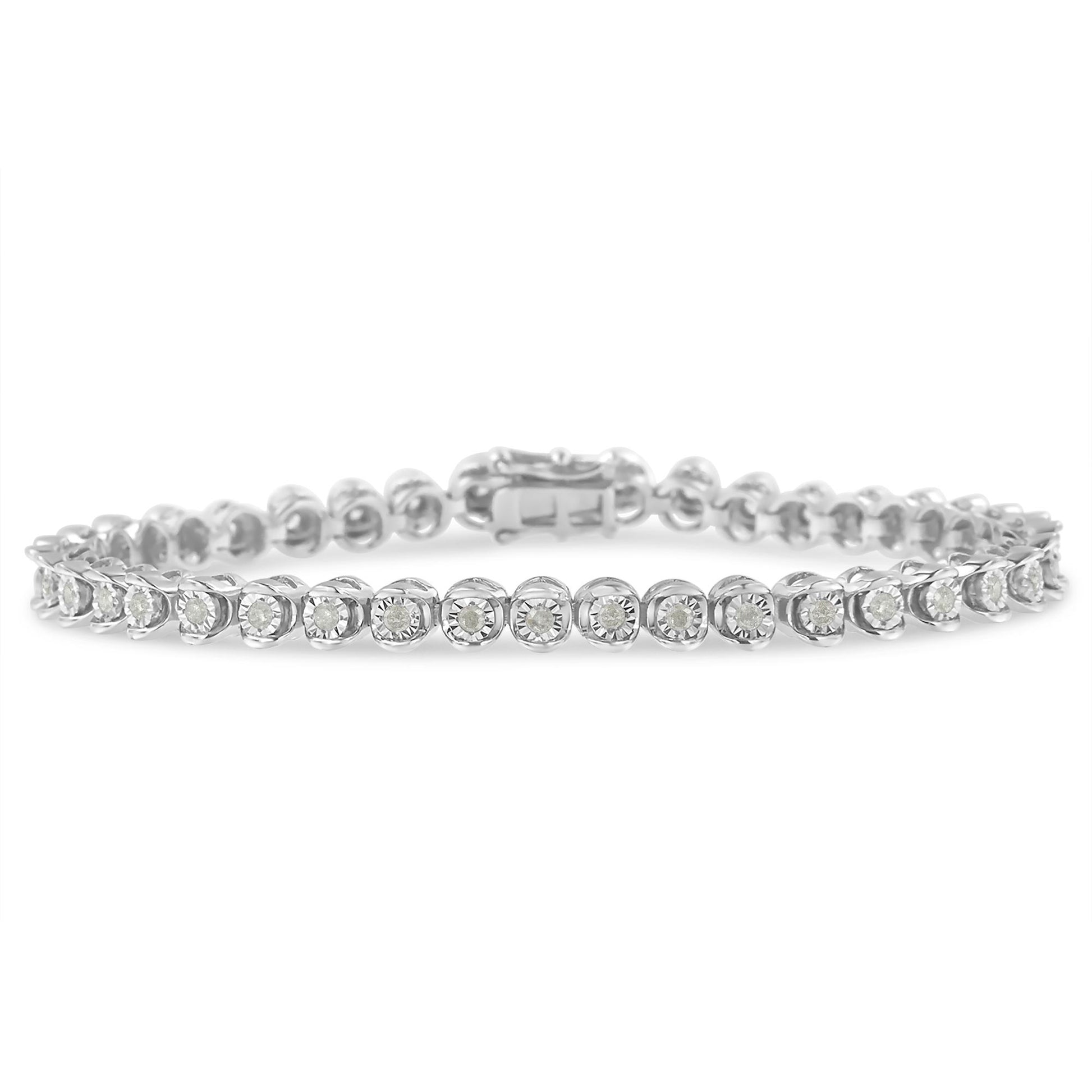 White metal bracelet with round white gemstones in miracle settings, displayed flat from the front angle.
