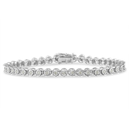 White metal bracelet with round white gemstones in miracle settings, displayed flat from the front angle.
