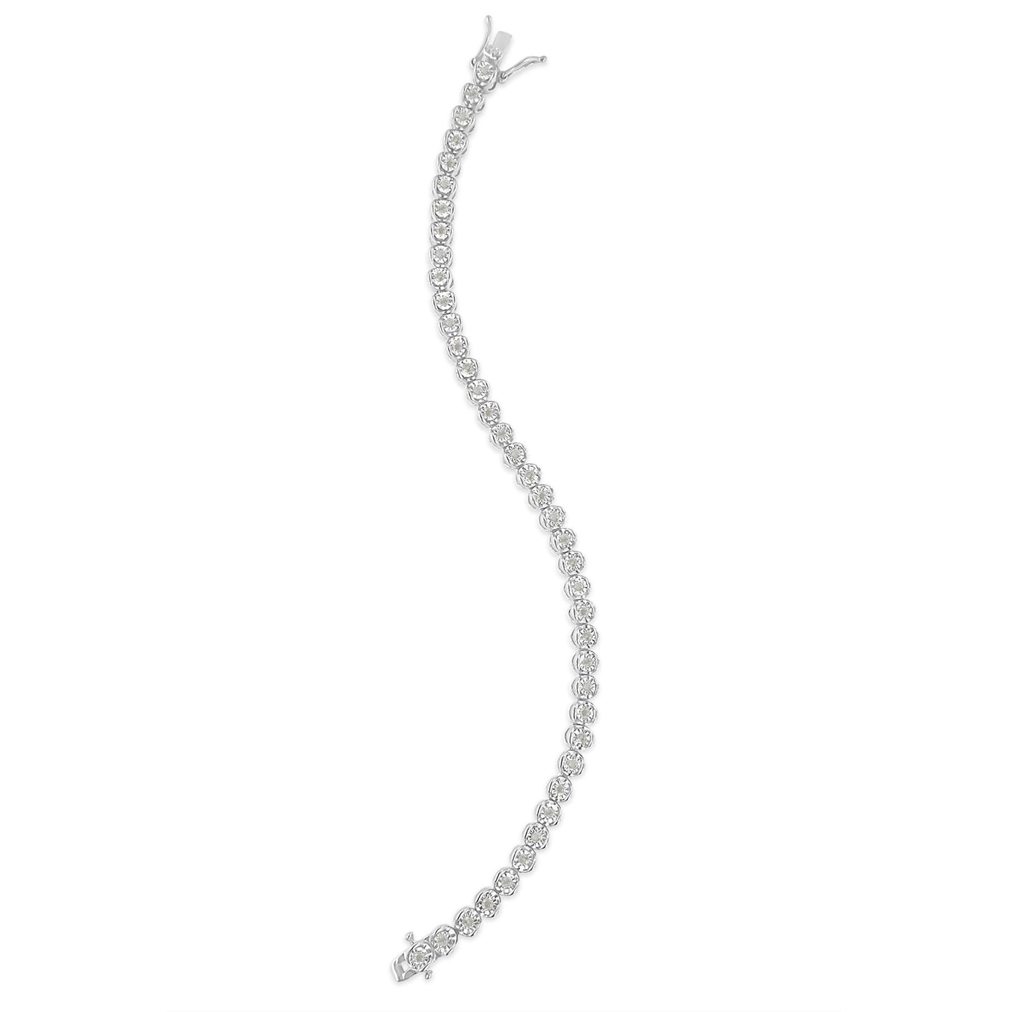 Curved white bracelet with round white gemstones in a miracle setting, photographed from above.