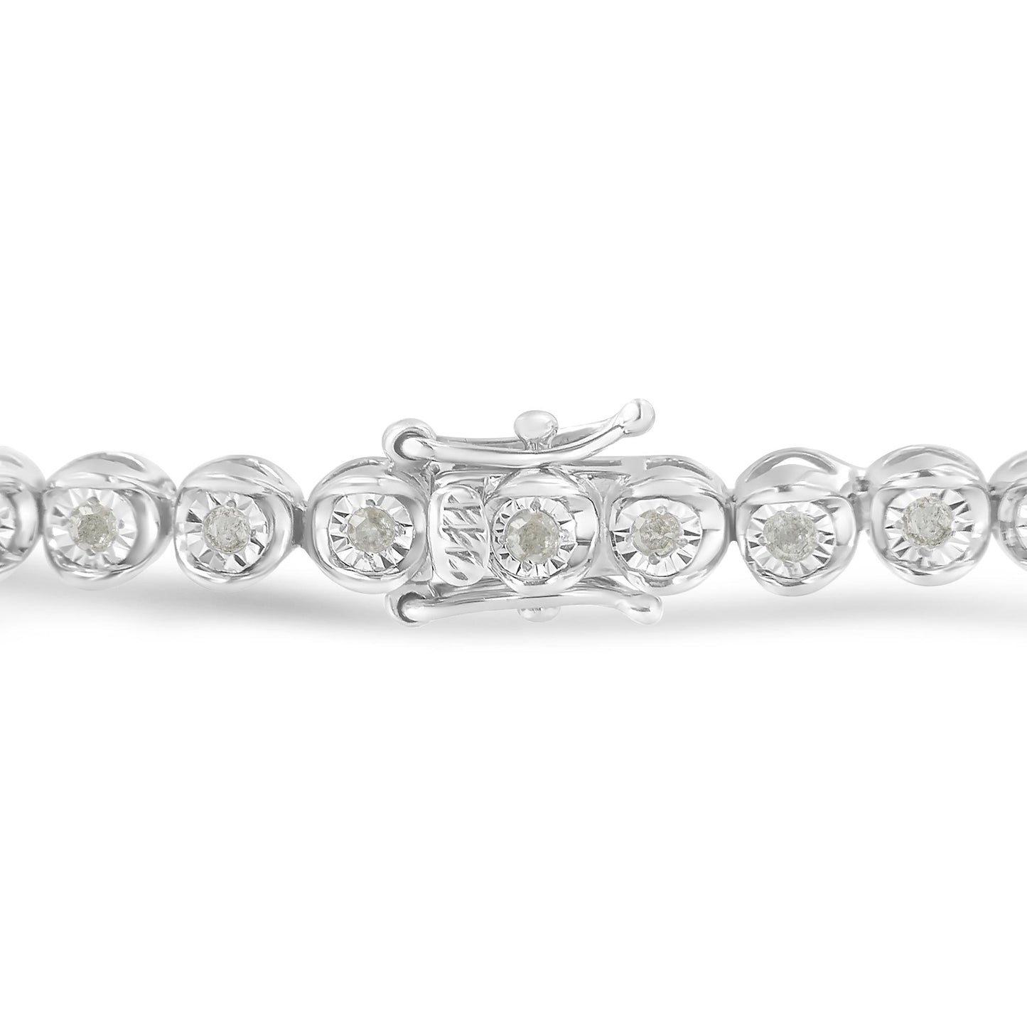 Close-up front angle of a white bracelet with round white gemstones set in a miracle setting, showing the clasp detail.