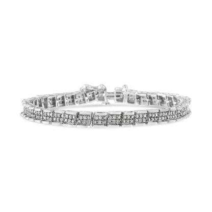 White metal bracelet with round white gemstones in pave setting, shown from a front angle on a white background.