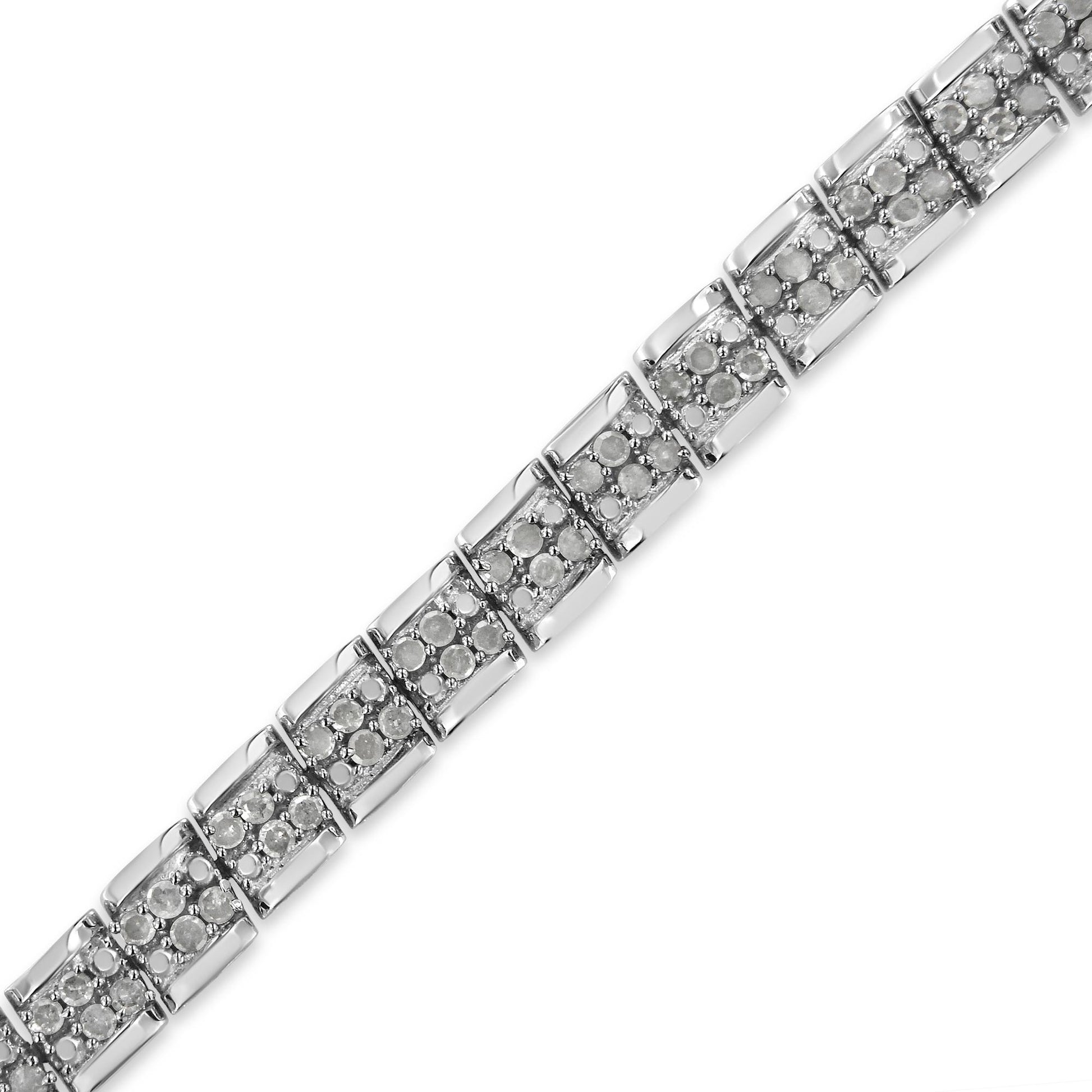 Close-up, angled view of a white metal bracelet with multiple linked sections, each featuring round white gemstones in a pave setting.