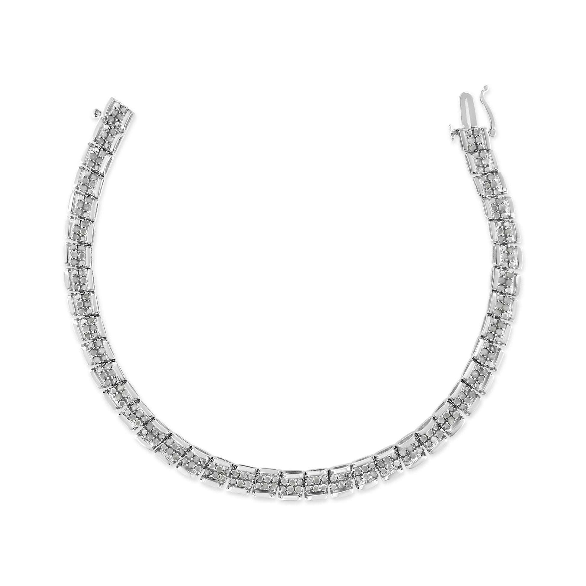 White metal bracelet with rectangular links featuring round white gemstones in pave setting, shown flat on a white background from a top-down angle.