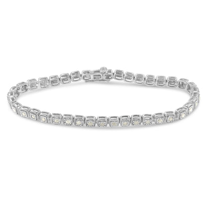 White metal bracelet with round white gemstones in a miracle setting, shown at a slight angle on a white background.