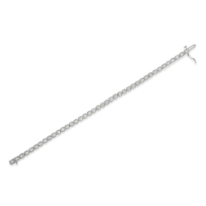 White metal bracelet with round white gemstones in miracle settings, shown laying flat in a diagonal top-down view.