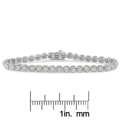 White metal bracelet with round white gemstones in square settings, shown from a front angle, placed above a ruler for size reference.