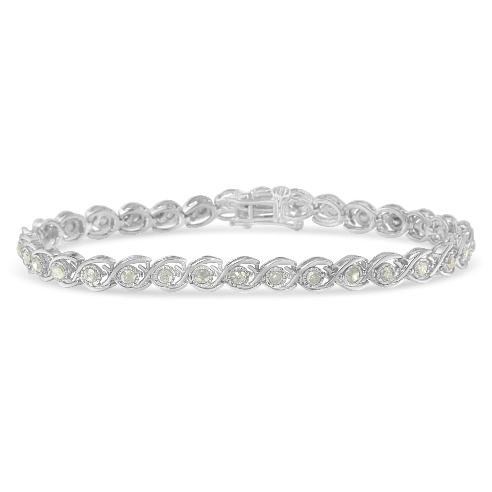 White metal bracelet with round white gemstones in a twisted pattern, shown from a side angle.