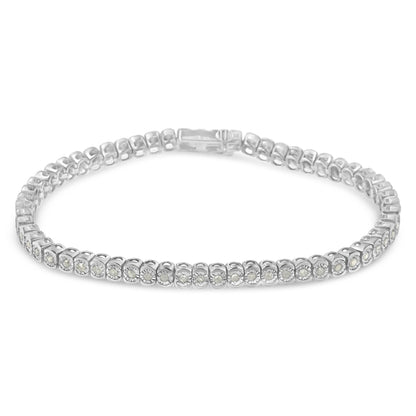 White metal bracelet with round white gemstones in a miracle setting, shown from a front angled view.