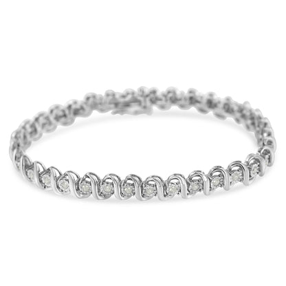 White metal bracelet with round white gemstones in a spiral setting, shown from a front angle.