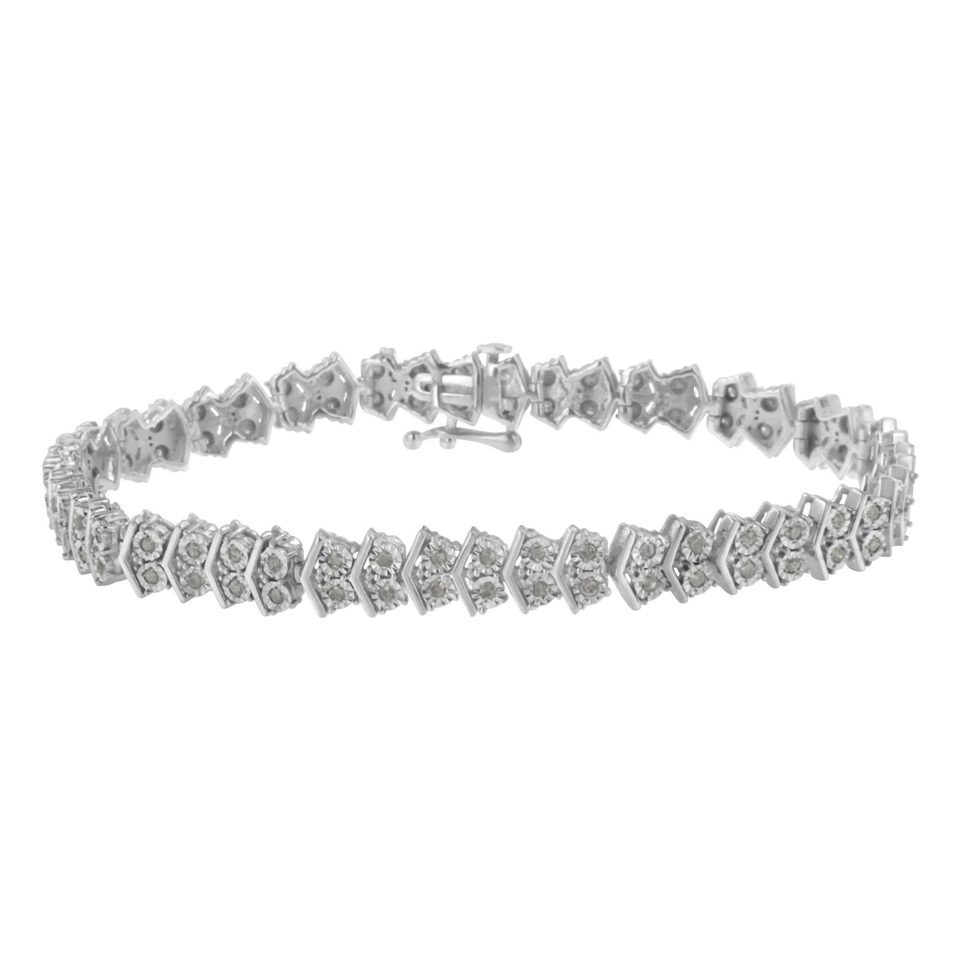 White metal bracelet with round white gemstones in a miracle setting, shown in a front angle view.