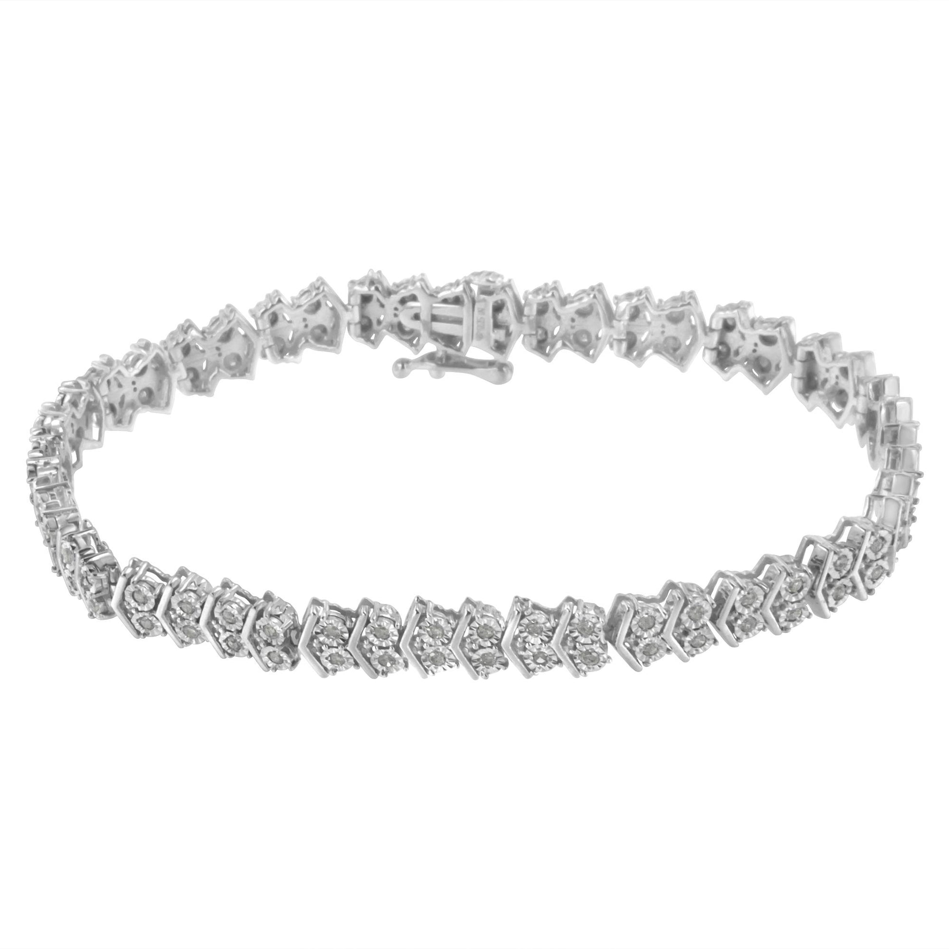 White metal bracelet with round white gemstones in a miracle setting, shown from a slightly elevated front angle.