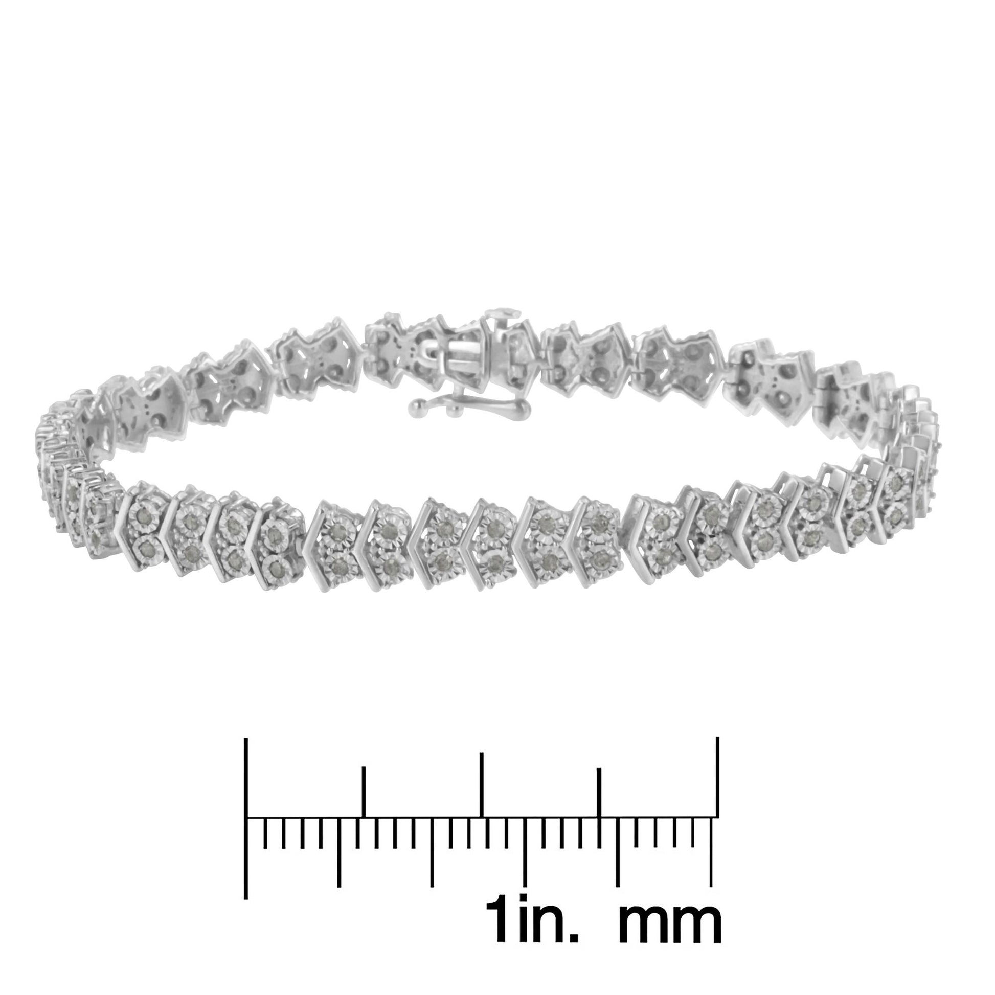 White metal bracelet with round white gemstones in miracle setting, shown in a side angled view, placed above a ruler for size reference.