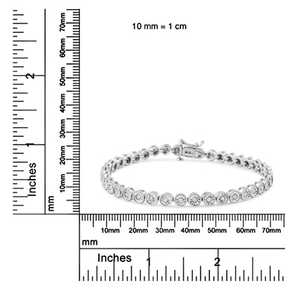 White metal bracelet with round white gemstones in a miracle setting, displayed flat on a ruler and scale for size reference, shot from a front angle.
