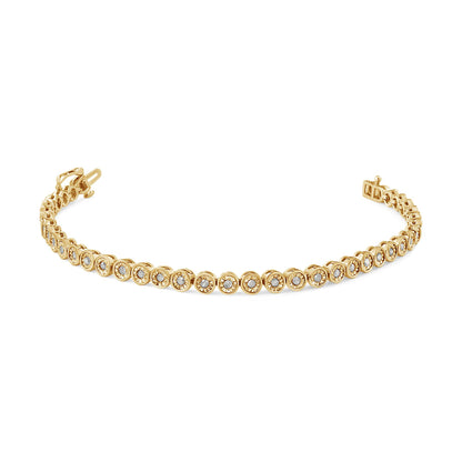 Bracelet photographed from a slight angle, featuring alternating yellow and white metal with round white gemstones in a circular setting along its length.