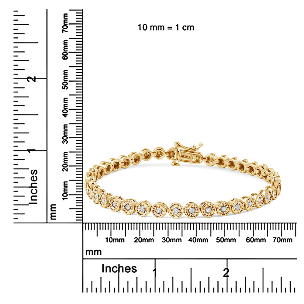 Bracelet with round white gemstones set in alternating yellow and white metal, shown flat on a ruler for size reference, front angle.