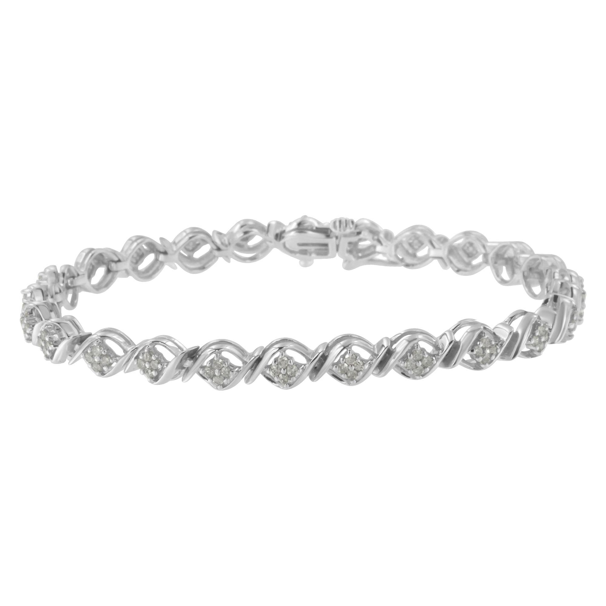 White metal bracelet with a twisted design and clusters of round white gemstones, shown from a front angle.