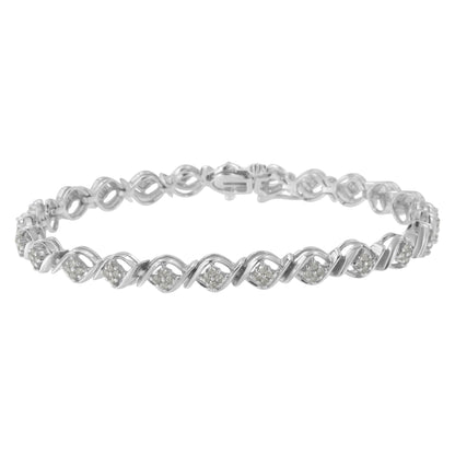 White metal bracelet with a twisted design and clusters of round white gemstones, shown from a front angle.