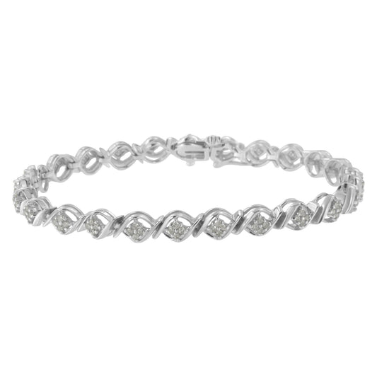 White metal bracelet with a twisted design and clusters of round white gemstones, shown from a front angle.