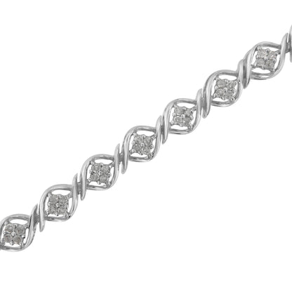 White metal bracelet with alternating twisted links and clusters of round white gemstones, shown at an angle on a white background.