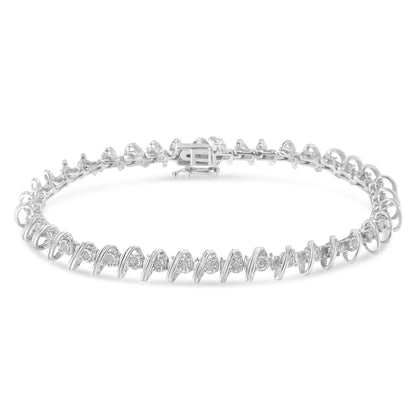 White metal bracelet with round white gemstones in miracle setting, shown from a slightly elevated front angle.