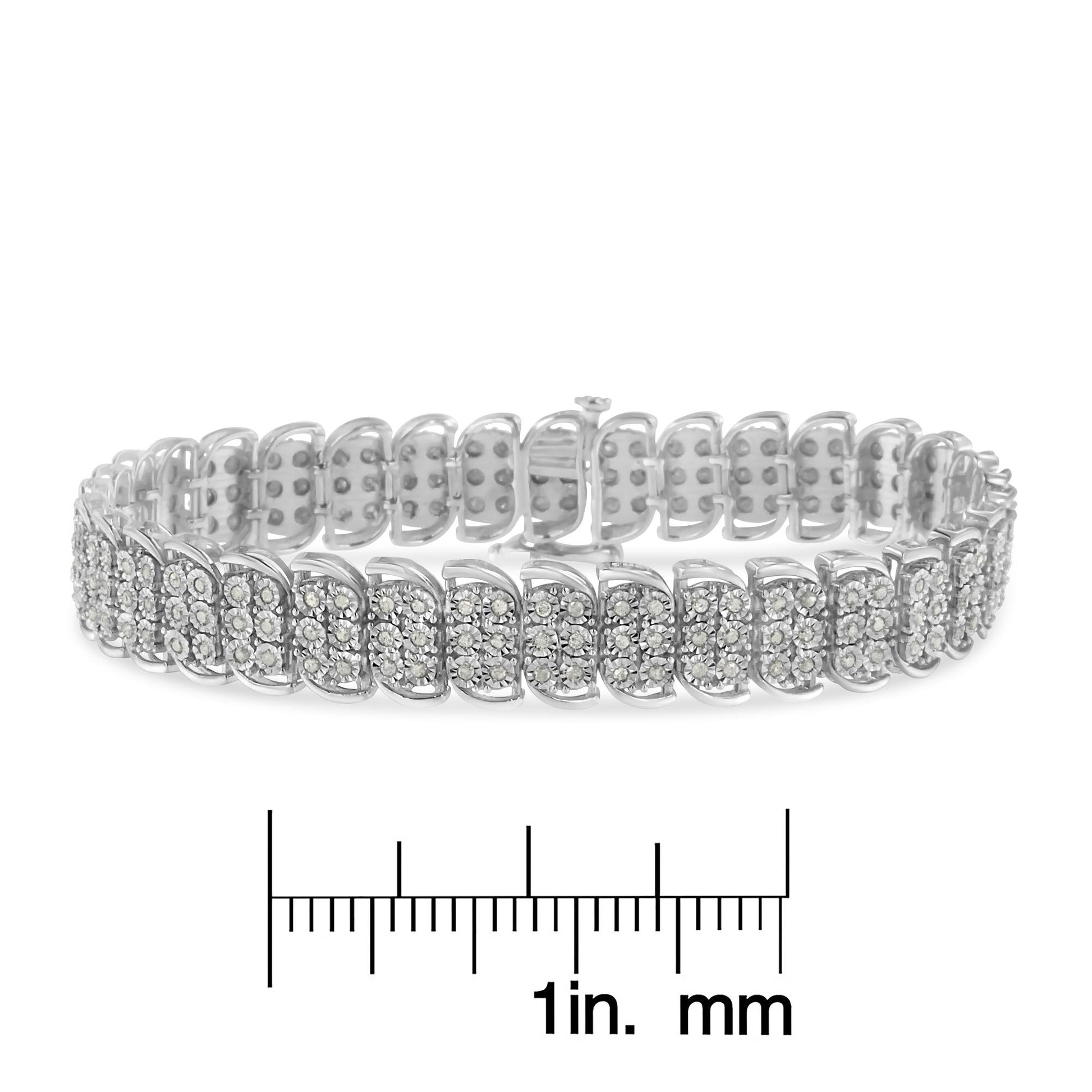 White metal bracelet with rows of round white gemstones in miracle setting, displayed flat above a ruler for size reference, shot from a front angle.