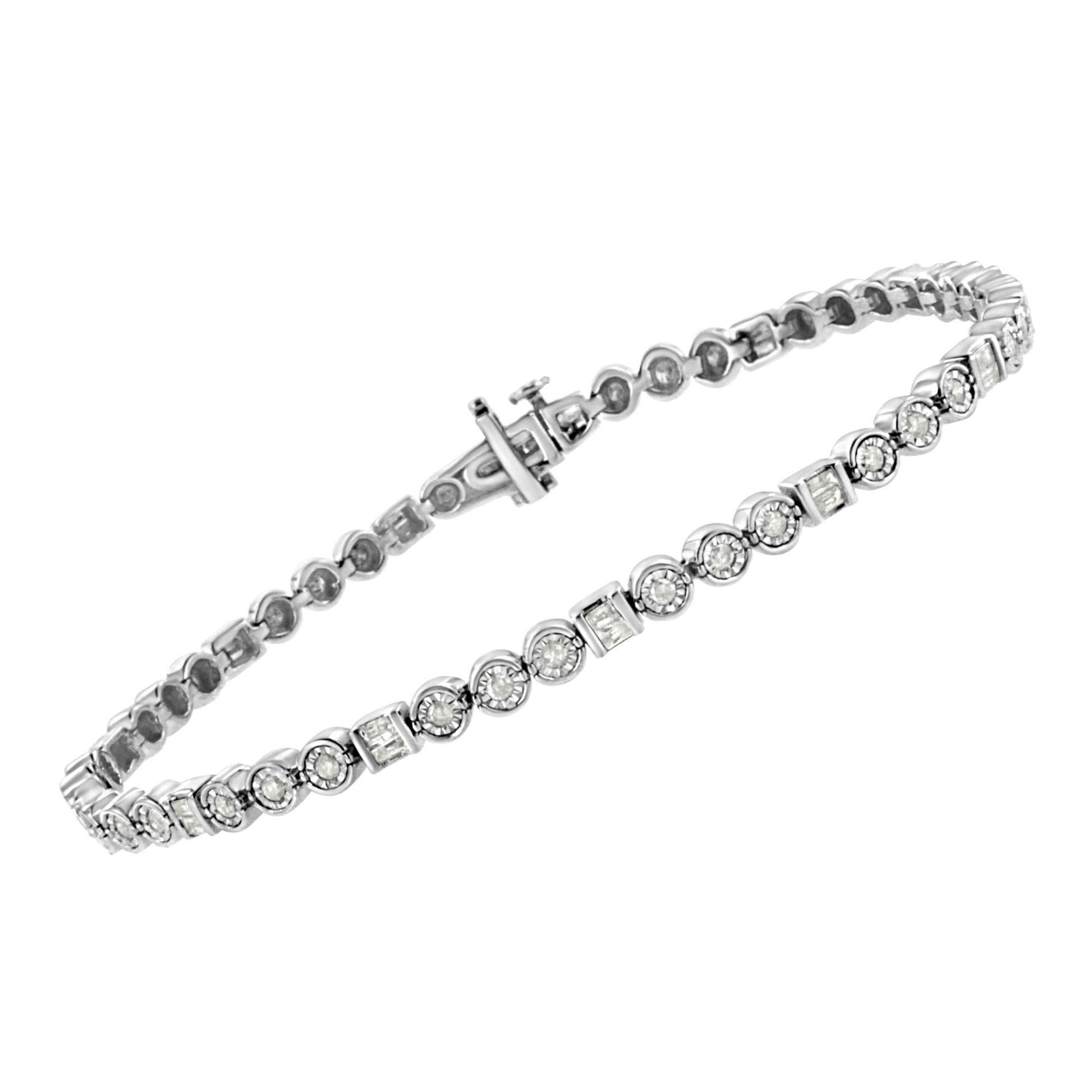 White metal bracelet with alternating round and baguette-shaped white gemstones in miracle and channel settings, angled slightly from above.