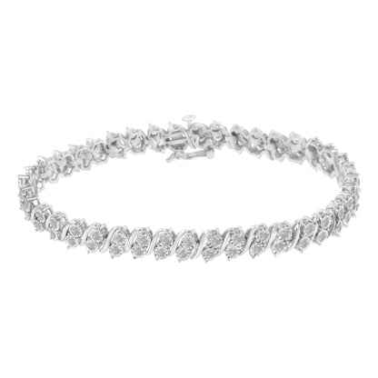 White metal bracelet with round white gemstones in a miracle setting, shown in a front angle view.
