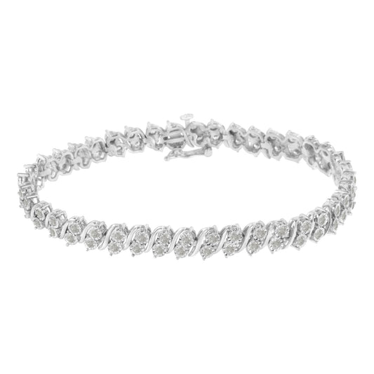 White metal bracelet with round white gemstones in a miracle setting, shown in a front angle view.