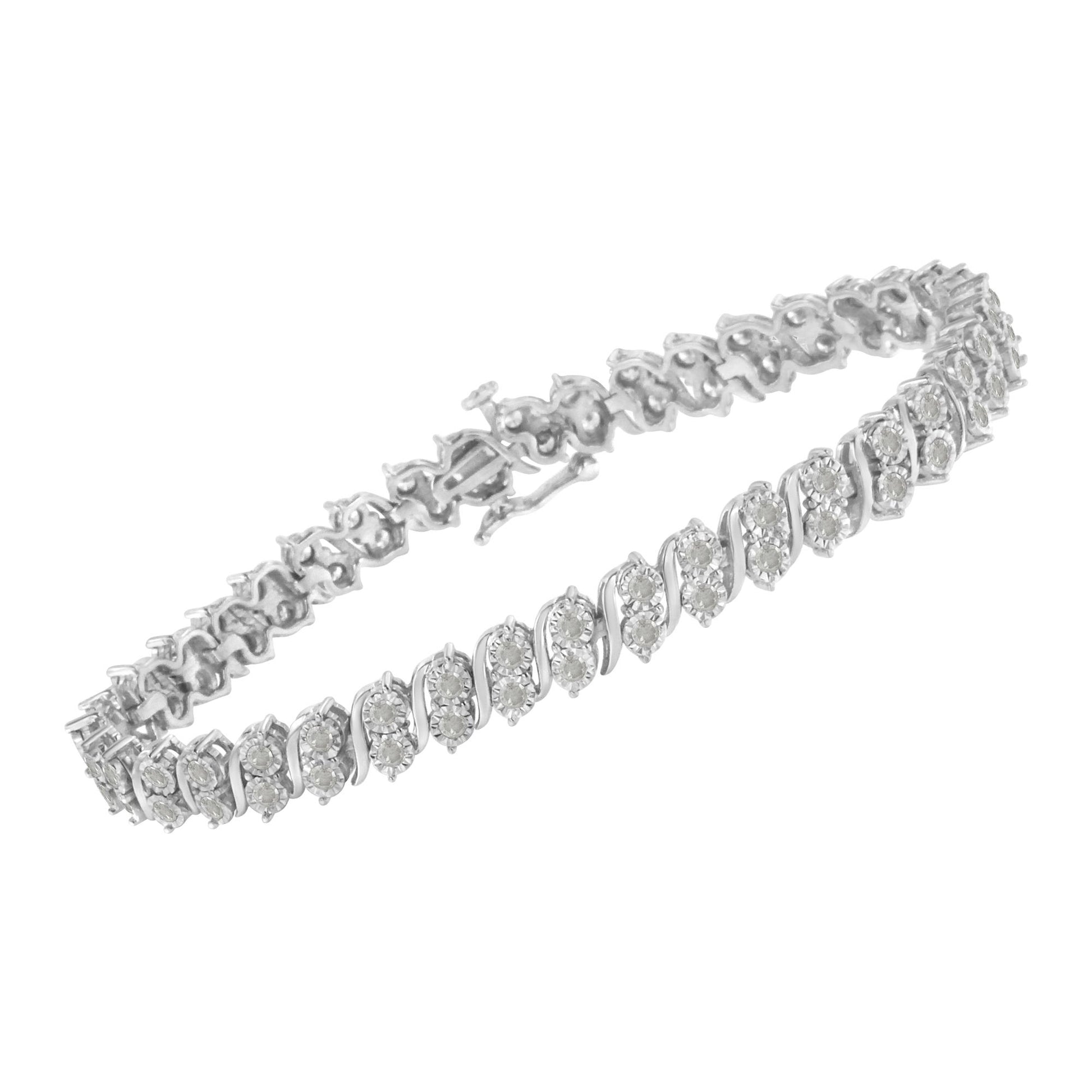 White metal bracelet with round white gemstones set in a spiral pattern, shown at an angled top view.