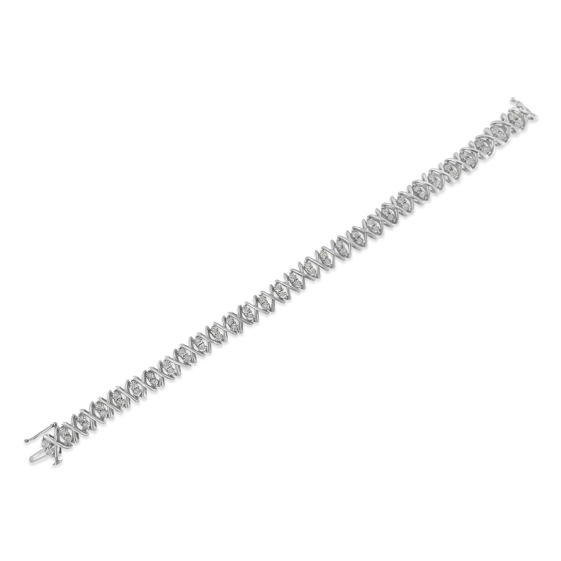 White metal bracelet with round white gemstones in a crisscross pattern, shown from a top angled view.