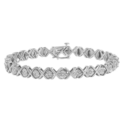 White metal bracelet with an alternating X and round setting design featuring round white gemstones, shot from a front angle against a white background.