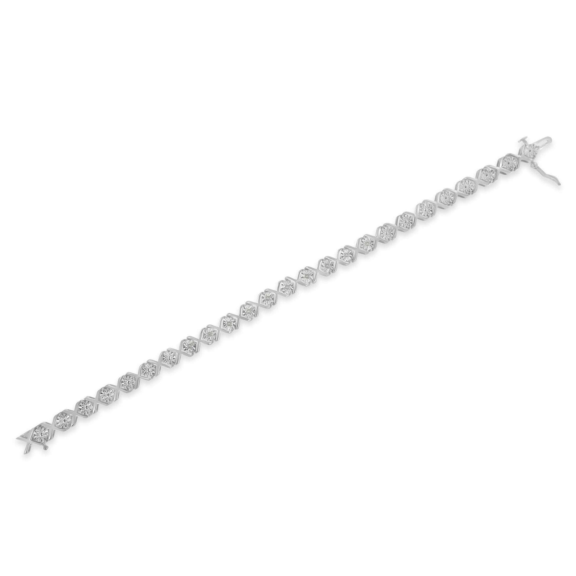 White metal bracelet with round white gemstones in a miracle setting, shown flat at a slight angle.