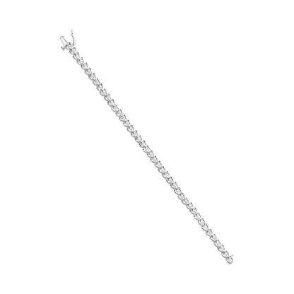 White metal bracelet with round white gemstones in prong settings, shown in a flat lay image from a top-down angle.