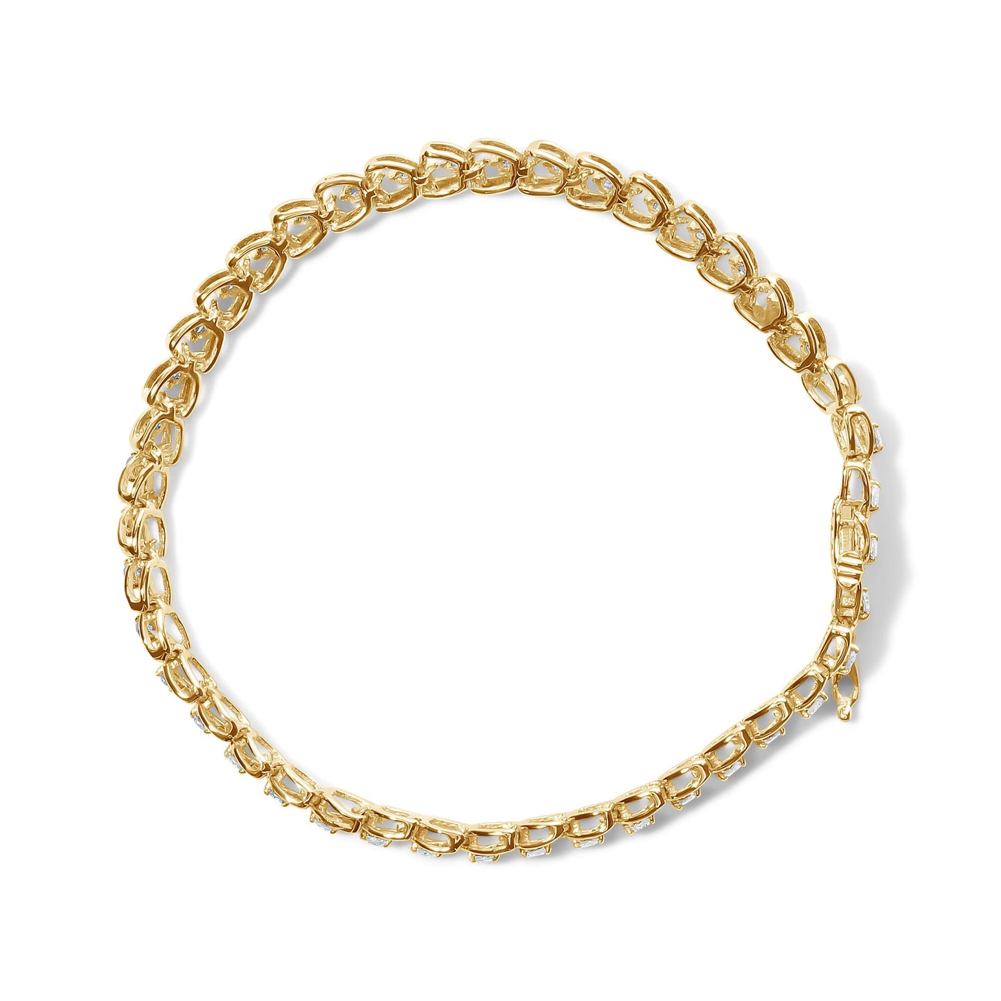 Top-down view of a yellow metal bracelet with round white gemstones in prong settings along the links.