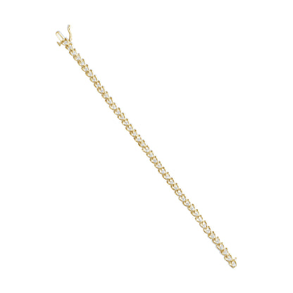 Yellow metal bracelet with round white gemstones in prong settings, shown flat from a top-down angle.