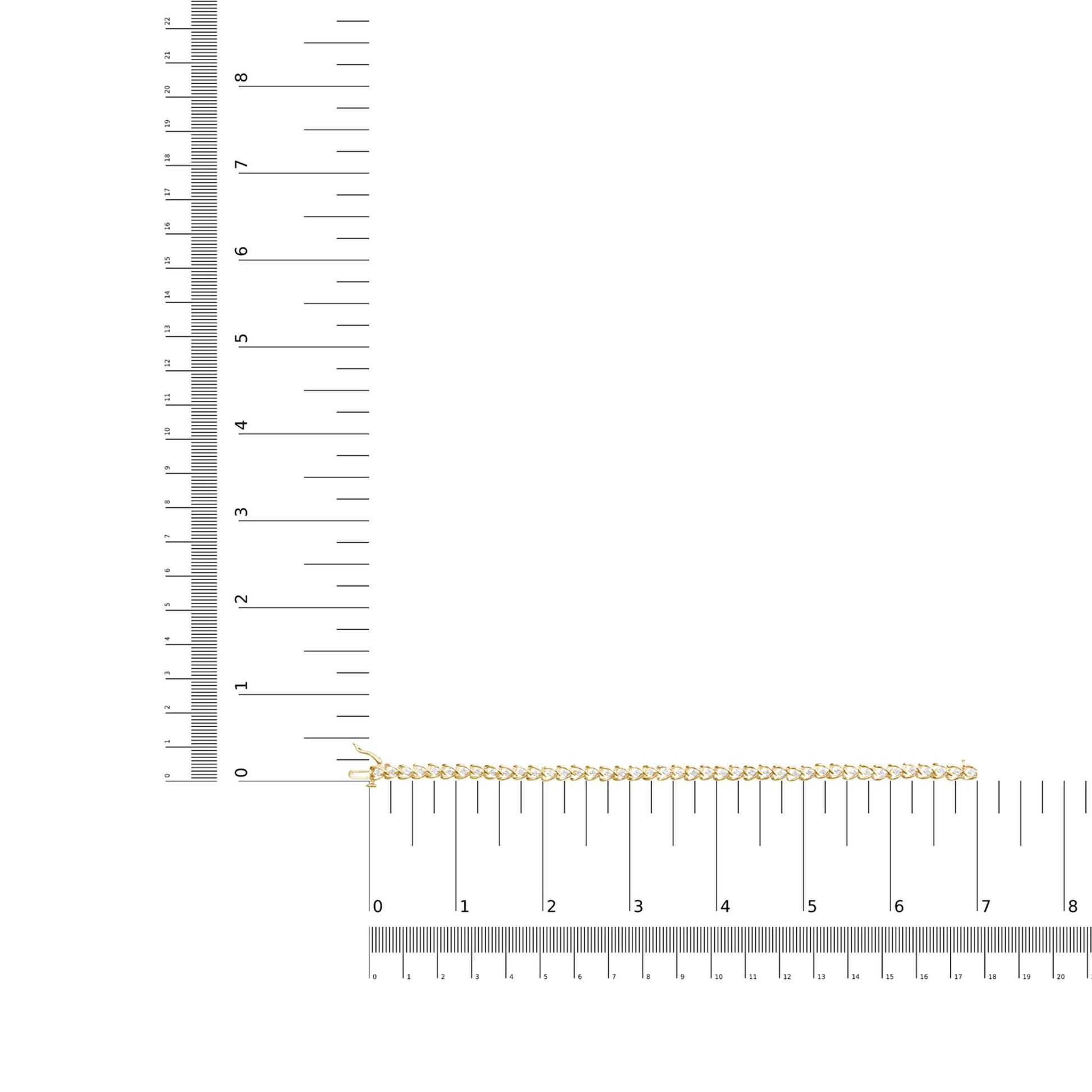 Yellow bracelet with round white gemstones in prong settings, laid flat on a ruler and scale for size reference, viewed from above.