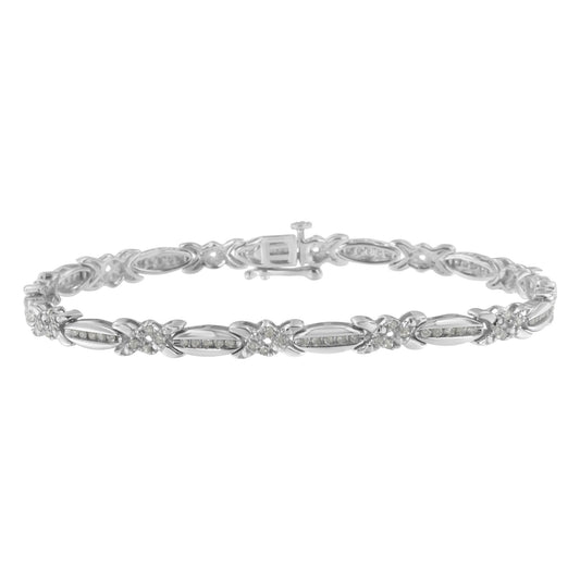 White metal bracelet with alternating oval and floral links set with small round white gemstones in a pave setting, shown in a front-facing close-up angle.
