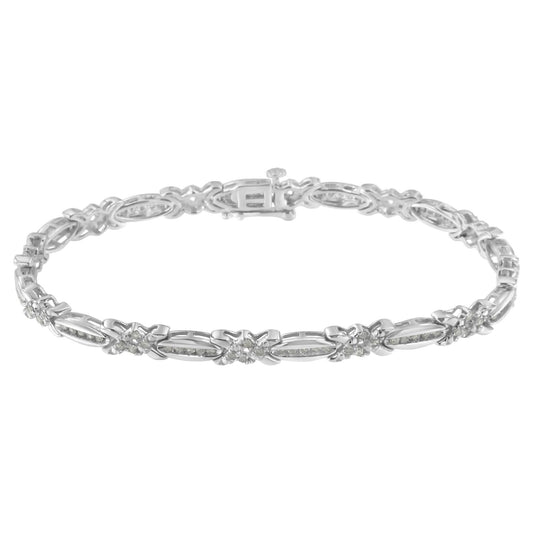 White metal bracelet with alternating oval and X-shaped links, each set with round white gemstones in pave setting, shown from front angle.