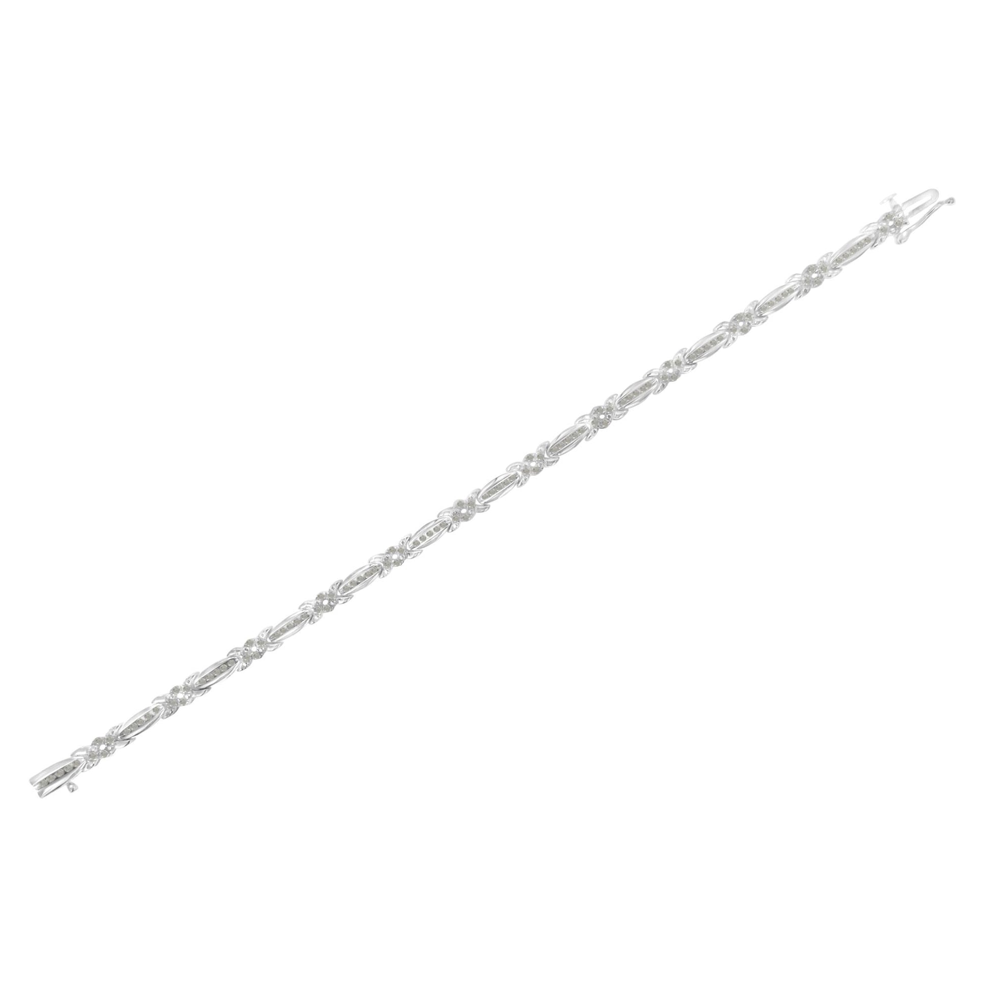 White bracelet with alternating oval and flower-shaped links featuring round white gemstones in pave setting, shown against a white background from a top-down angle.