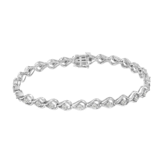 White metal bracelet with round white gemstones set in a linked design, photographed from a front angle on a white background.