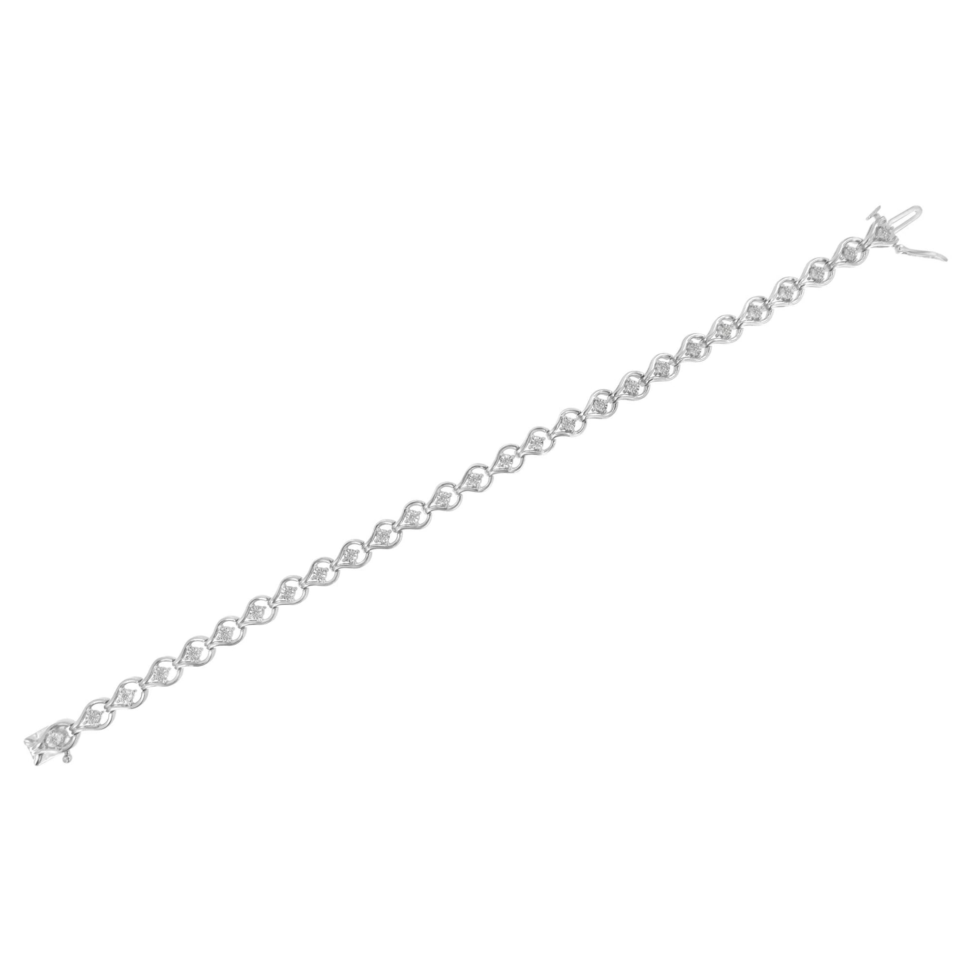 White metal bracelet with round white gemstones in a linked pattern, shown flat from a top-down angle.