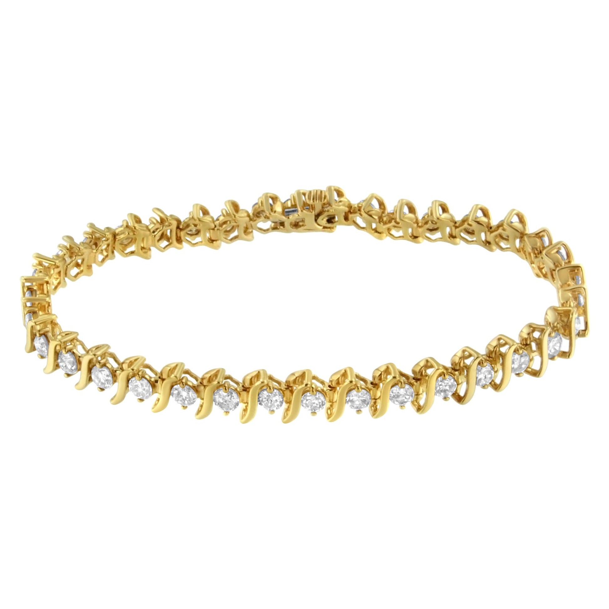 Yellow metal bracelet with round prong-set white gemstones, shown from a side angle.