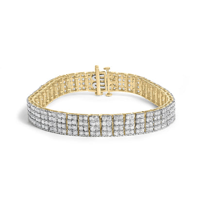Close-up front angle of a yellow metal bracelet with multiple rows of small white gemstones set in a shared prong setting, showing the clasp open.