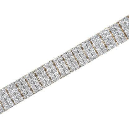 Close-up angled view of a yellow metal bracelet featuring multiple rows of small white round gemstones in a shared prong setting.