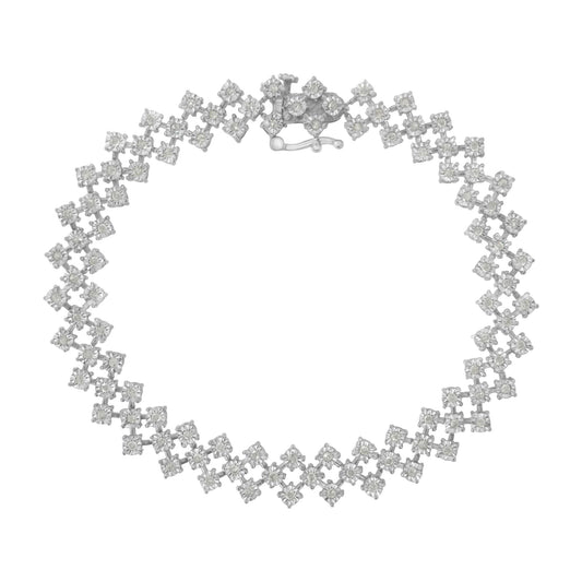 Top-down view of a white metal bracelet with round white gemstones set in a miracle setting forming a geometric pattern.