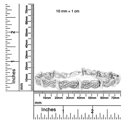White bracelet with an intricate linked design featuring round white gemstones in a pave setting, displayed on a ruler for size reference, front-facing angle.
