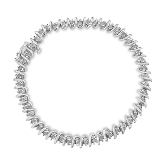 Top view of a white-colored bracelet with round white gemstones in a spiral setting.