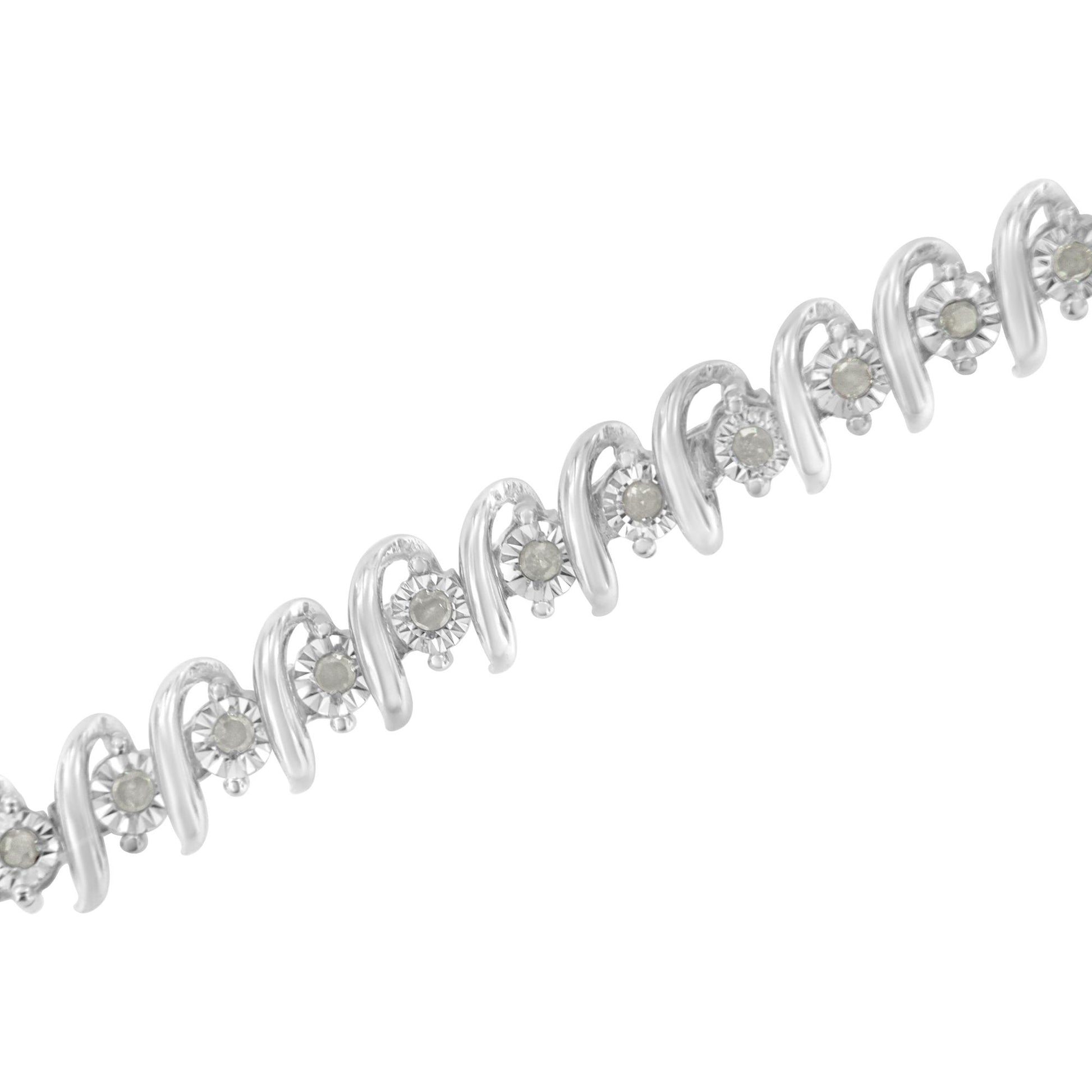 White metal bracelet with alternating round white gemstones and curved metal designs, shown in a close-up angled view.